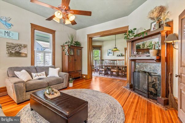 Dining room, Fireplace, Interior, Living room, Pendant Lights, Wood Texture Flooring
