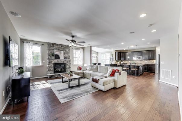 Fireplace, Interior, Kitchen, Living room, Pendant Lights, Recessed Lighting, Stone Walls, Wood Texture Flooring