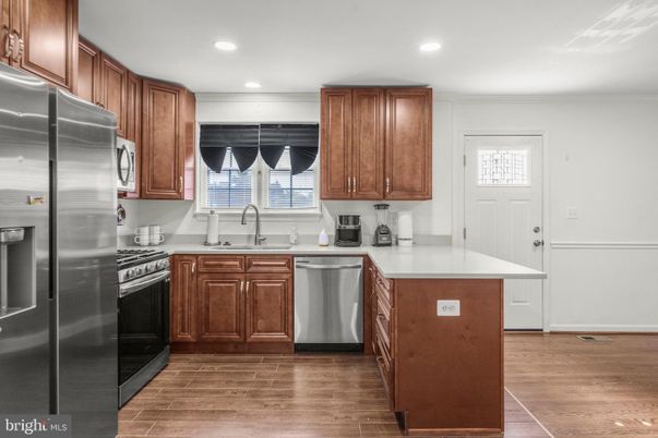 Interior, Kitchen, Recessed Lighting, Stainless Steel Appliances, Wood Texture Flooring