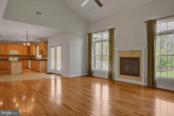 Empty room, Fireplace, Interior, Kitchen, Pendant Lights, Recessed Lighting, Wood Texture Flooring