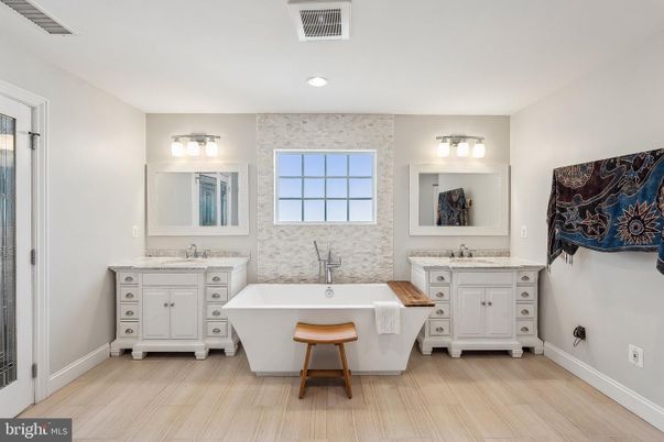 Bathroom, Dual Sink Vanities, Free Standing Baths, Interior, Recessed Lighting, Wood Texture Flooring