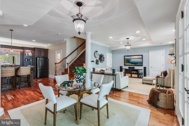 Dining room, Fireplace, Interior, Living room, Pendant Lights, Recessed Lighting, Wood Texture Flooring