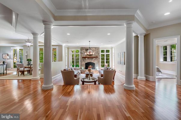 Dining room, Fireplace, Interior, Living room, Recessed Lighting, Wood Texture Flooring