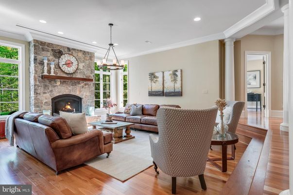 Fireplace, Interior, Living room, Pendant Lights, Recessed Lighting, Stone Walls, Wood Texture Flooring