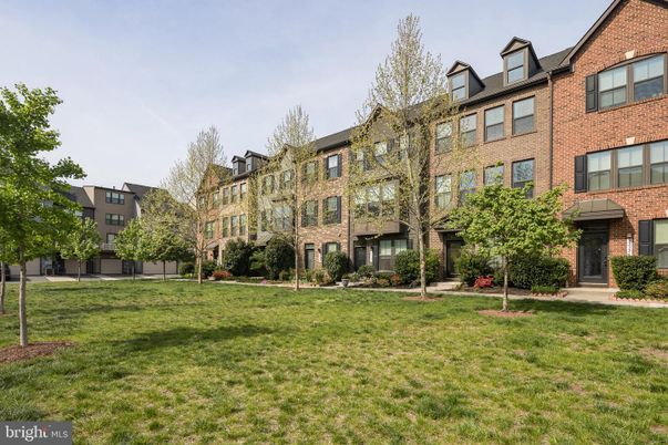 Backyard, Exterior, Facade, Brick Facade, Condo Building