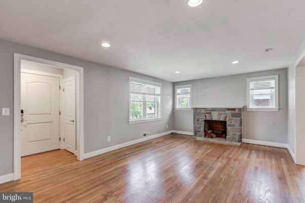 Empty room, Fireplace, Interior, Recessed Lighting, Wood Texture Flooring