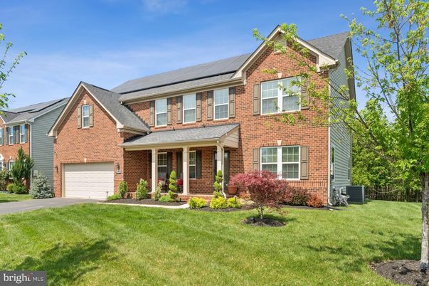 Attached, Exterior, Facade, Brick Facade, Solar Panels, Brick Traditional