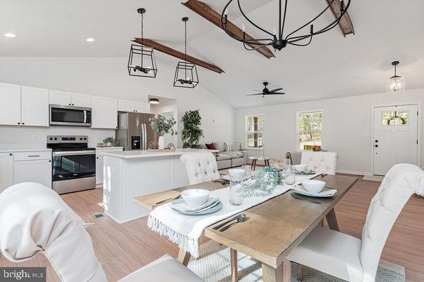 Dining room, Interior, Kitchen, Living room, Pendant Lights, Recessed Lighting, Stainless Steel Appliances, Wood Texture Flooring