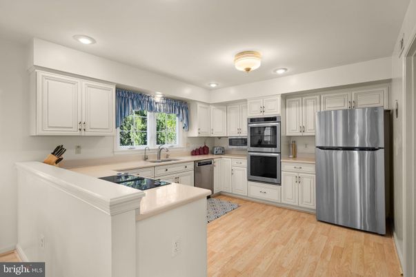 Interior, Kitchen, Recessed Lighting, Stainless Steel Appliances, Wood Texture Flooring
