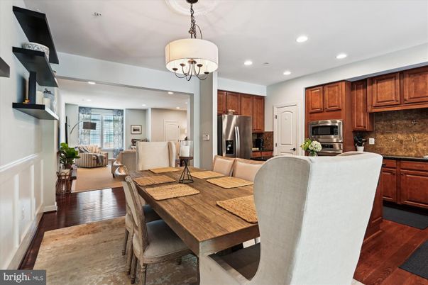 Chandelier, Dining room, Interior, Kitchen, Living room, Recessed Lighting, Stainless Steel Appliances, Wood Texture Flooring