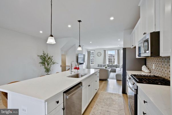 Dining room, Interior, Kitchen, Living room, Pendant Lights, Recessed Lighting, Stainless Steel Appliances, Wood Texture Flooring