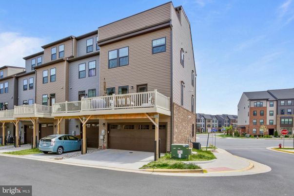 Attached, Exterior, Facade, Condo Building