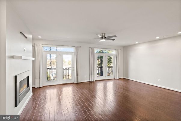 Empty room, Fireplace, Interior, Recessed Lighting, Wood Texture Flooring