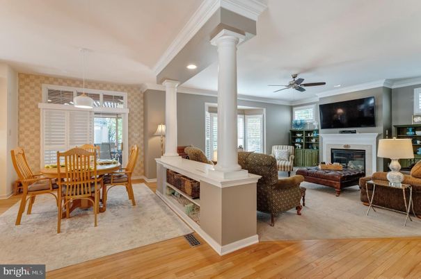 Dining room, Fireplace, Interior, Living room, Pendant Lights, Recessed Lighting, Wood Texture Flooring