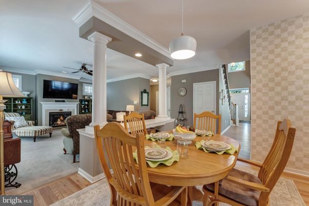 Dining room, Fireplace, Interior, Living room, Pendant Lights, Recessed Lighting, Wood Texture Flooring