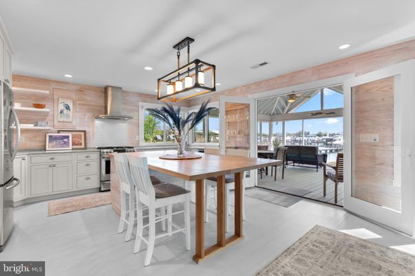 Dining room, Interior, Kitchen, Pendant Lights, Recessed Lighting, Stainless Steel Appliances, Wooden Walls