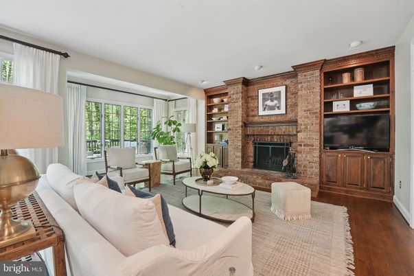 Fireplace, Interior, Living room, Recessed Lighting, Stone Walls, Wood Texture Flooring