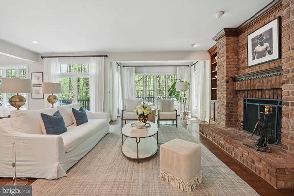 Fireplace, Interior, Living room, Recessed Lighting, Stone Walls, Wood Texture Flooring