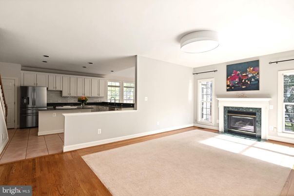 Empty room, Fireplace, Interior, Kitchen, Recessed Lighting, Wood Texture Flooring
