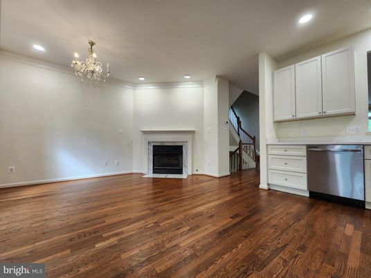 Chandelier, Fireplace, Interior, Kitchen, Recessed Lighting, Wood Texture Flooring