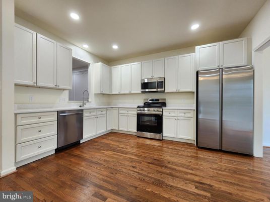Interior, Kitchen, Recessed Lighting, Stainless Steel Appliances, Wood Texture Flooring