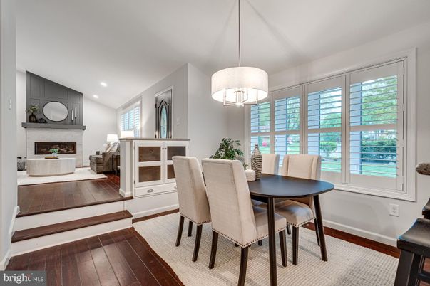 Dining room, Fireplace, Interior, Pendant Lights, Recessed Lighting, Wood Texture Flooring