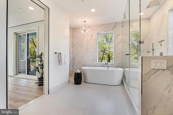 Bathroom, Free Standing Baths, Glass Shower, Interior, Marble Walls, Recessed Lighting, Wood Texture Flooring
