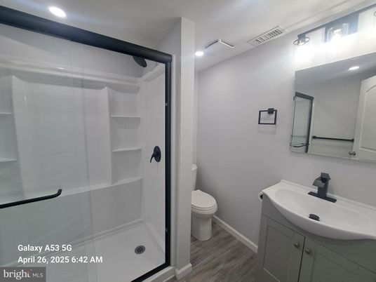 Bathroom, Glass Shower, Interior, Recessed Lighting, Wood Texture Flooring