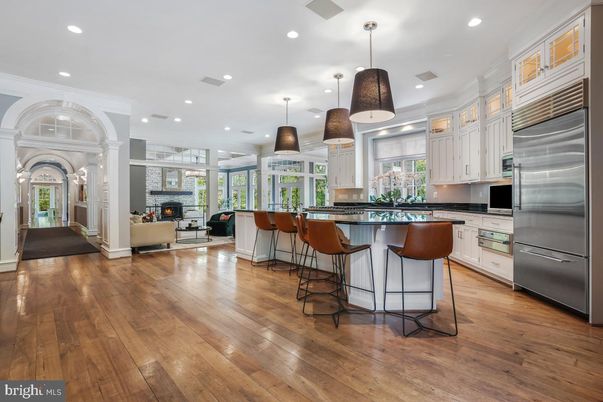 Fireplace, Interior, Kitchen, Pendant Lights, Recessed Lighting, Stainless Steel Appliances, Wood Texture Flooring