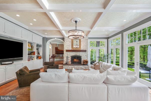 Chandelier, Fireplace, Interior, Living room, Recessed Lighting, Wood Texture Flooring
