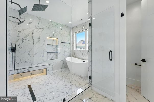 Bathroom, Free Standing Baths, Glass Shower, Interior, Marble, Marble Walls, Recessed Lighting