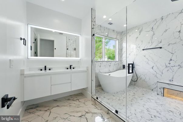 Bathroom, Dual Sink Vanities, Free Standing Baths, Glass Shower, Interior, Marble, Marble Walls, Recessed Lighting