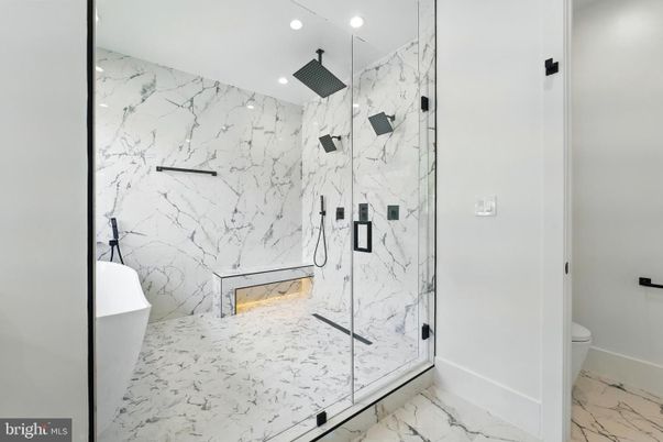 Bathroom, Free Standing Baths, Glass Shower, Interior, Marble, Marble Walls, Recessed Lighting