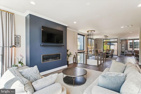 Dining room, Fireplace, Interior, Living room, Pendant Lights, Recessed Lighting, Wood Texture Flooring
