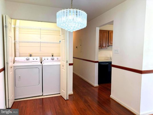 Chandelier, Interior, Utility Closets, Washer, Wood Texture Flooring