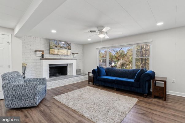 Fireplace, Interior, Recessed Lighting, Stone Walls, Wood Texture Flooring