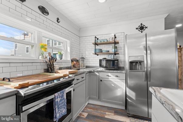 Interior, Kitchen, Recessed Lighting, Stainless Steel Appliances, Stone Walls, Wood Texture Flooring