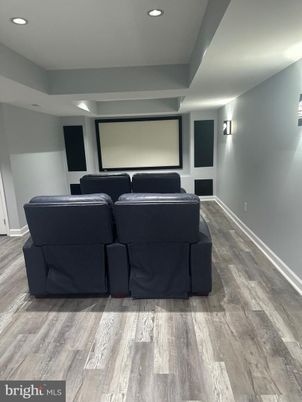 Interior, Projection Screen, Recessed Lighting, Theatre Room, Wood Texture Flooring