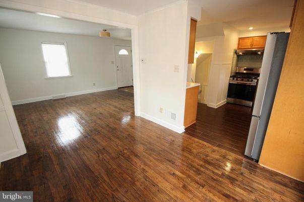 Empty room, Interior, Kitchen, Stainless Steel Appliances, Wood Texture Flooring