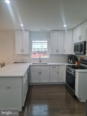 Interior, Kitchen, Marble Walls, Recessed Lighting, Wood Texture Flooring