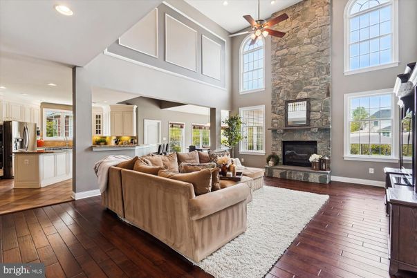 Fireplace, Interior, Kitchen, Living room, Recessed Lighting, Stone Walls, Wood Texture Flooring