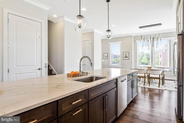 Dining room, Interior, Kitchen, Pendant Lights, Recessed Lighting, Stainless Steel Appliances, Wood Texture Flooring