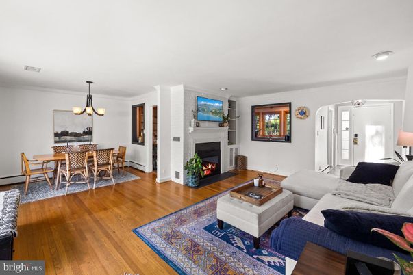Chandelier, Dining room, Fireplace, Interior, Living room, Recessed Lighting, Wood Texture Flooring
