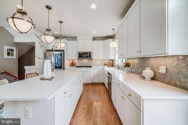 Interior, Kitchen, Pendant Lights, Recessed Lighting, Stainless Steel Appliances, Wood Texture Flooring