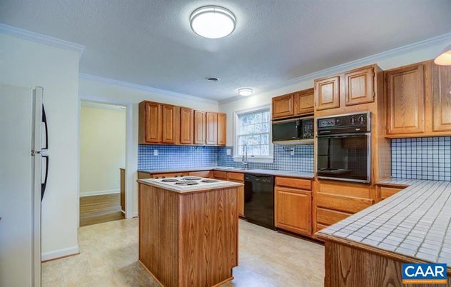 Interior, Kitchen, Tile Countertops, Wood Texture Flooring