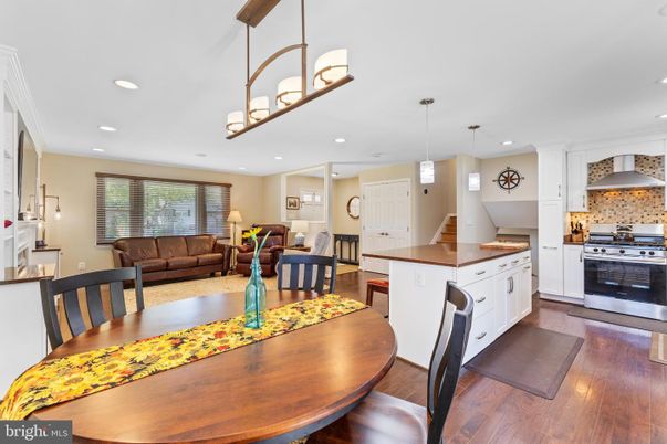 Dining room, Interior, Kitchen, Living room, Pendant Lights, Recessed Lighting, Stainless Steel Appliances, Wood Texture Flooring
