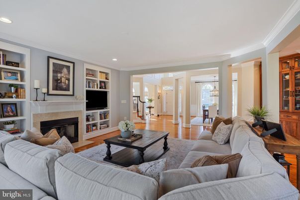 Dining room, Fireplace, Interior, Living room, Pendant Lights, Recessed Lighting, Wood Texture Flooring