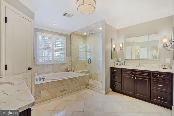 Bathroom, Dual Sink Vanities, Glass Shower, Interior, Marble Walls, Recessed Lighting