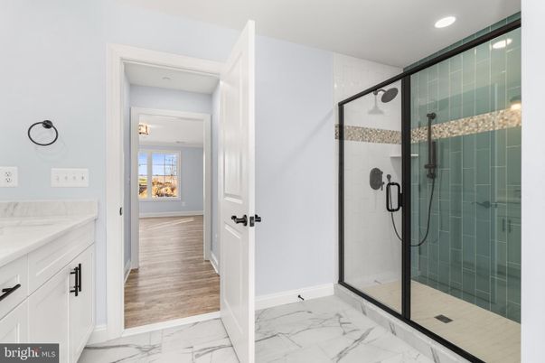 Bathroom, Glass Shower, Interior, Marble, Recessed Lighting, Wood Texture Flooring