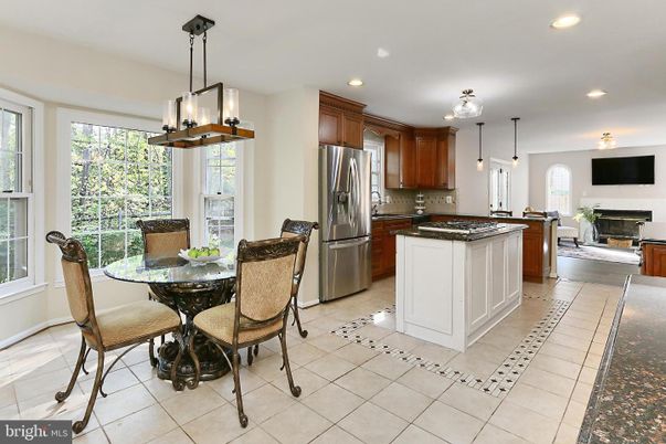 Dining room, Fireplace, Interior, Kitchen, Pendant Lights, Recessed Lighting, Stainless Steel Appliances